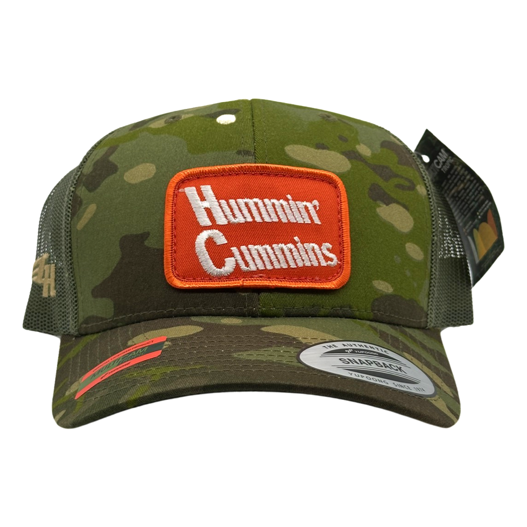 Vintage Hummin’ Cummins Patch sewn onto New Yupoong 6606 Multicam Tropic Green Camo