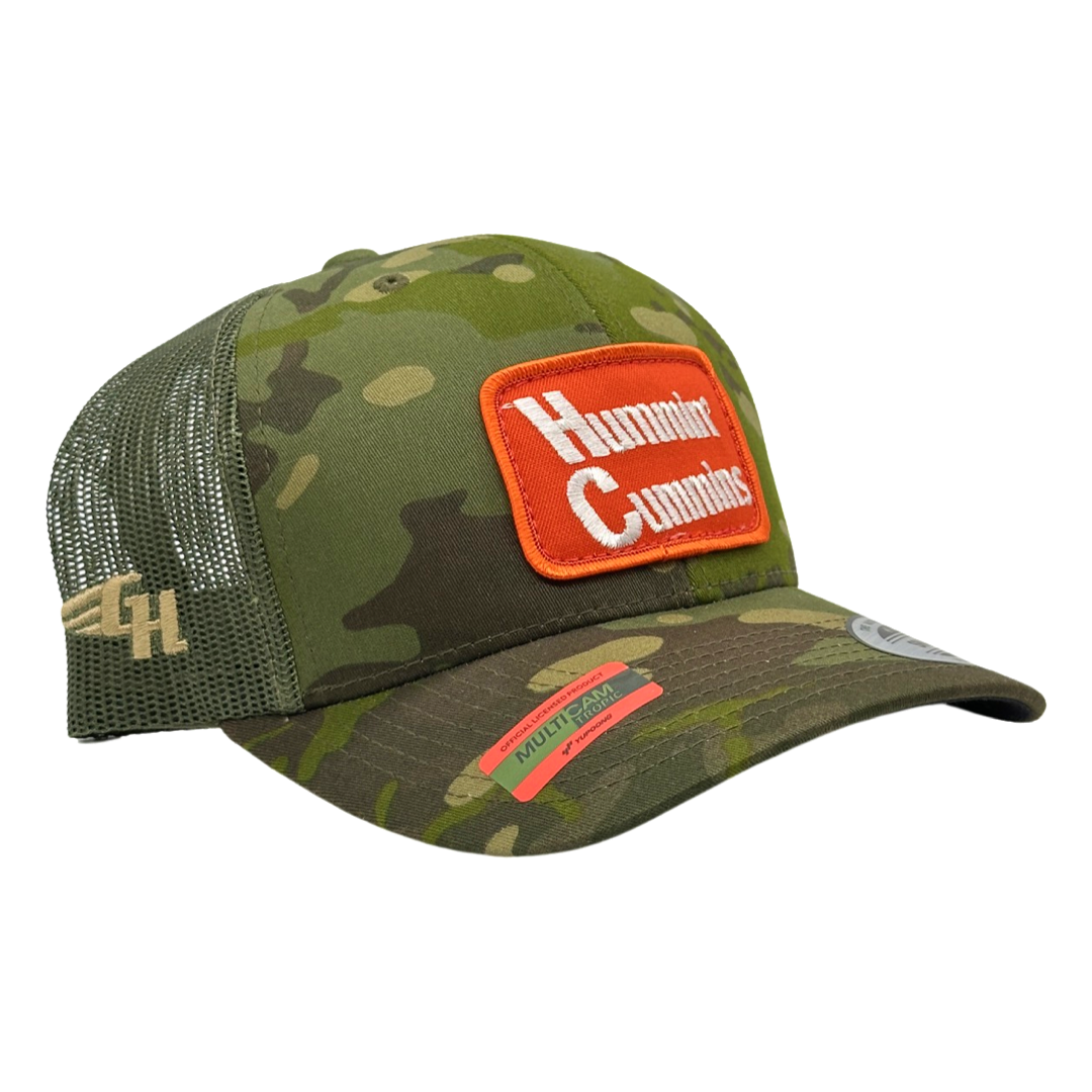 Vintage Hummin’ Cummins Patch sewn onto New Yupoong 6606 Multicam Tropic Green Camo