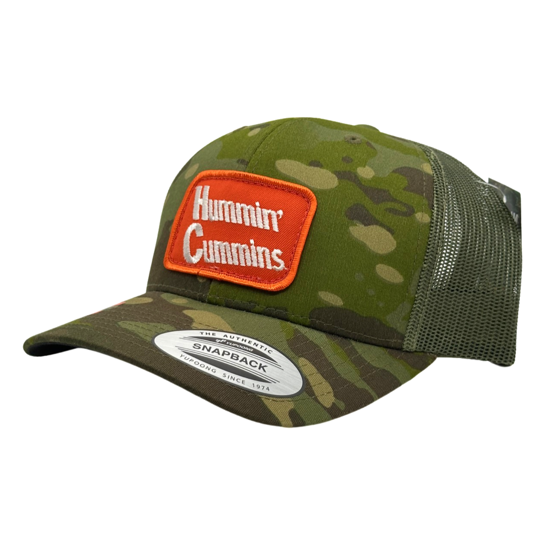 Vintage Hummin’ Cummins Patch sewn onto New Yupoong 6606 Multicam Tropic Green Camo